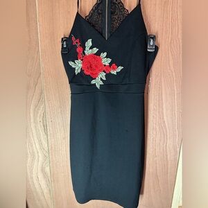 Black Dress with flowers on the front and open back